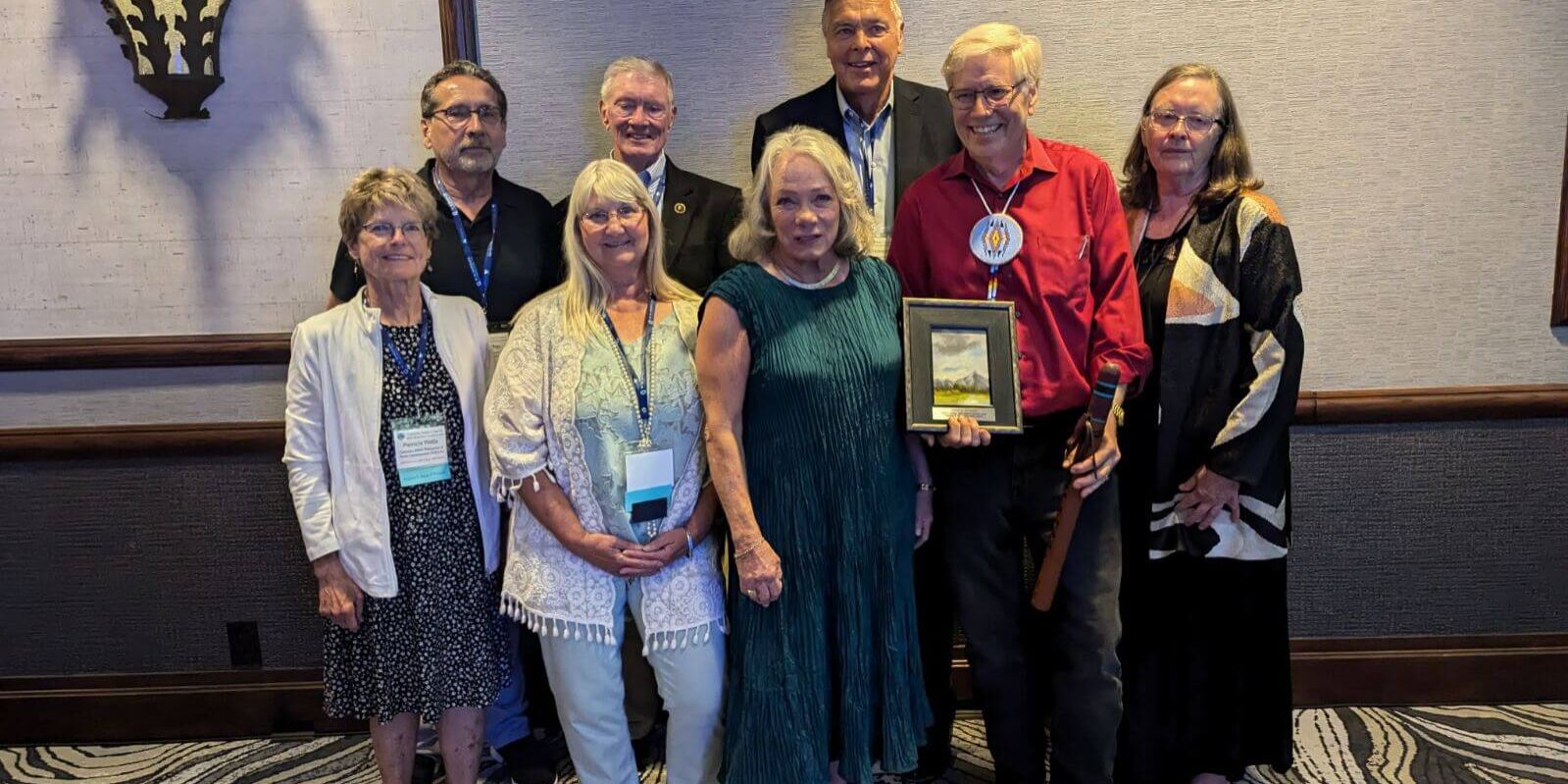 Doug Kemper was surrounded by previous Wayne N. Aspinall recipients at the CWC Summer Conference, where he received the award.